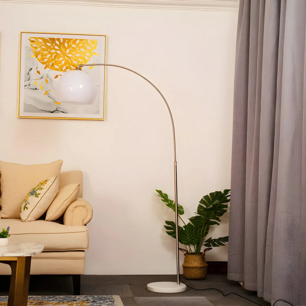 Modern curved metal LED floor lamp with orange dome shade